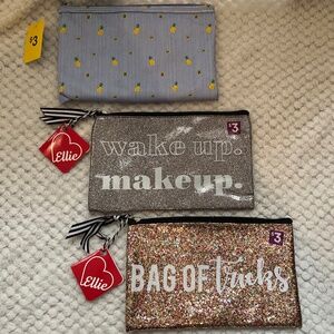 Cosmetic storage bags bundle including 3 bags. 2 sparkly and 1 pineapple